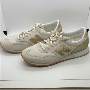 New Balance white and gold sneakers size 10